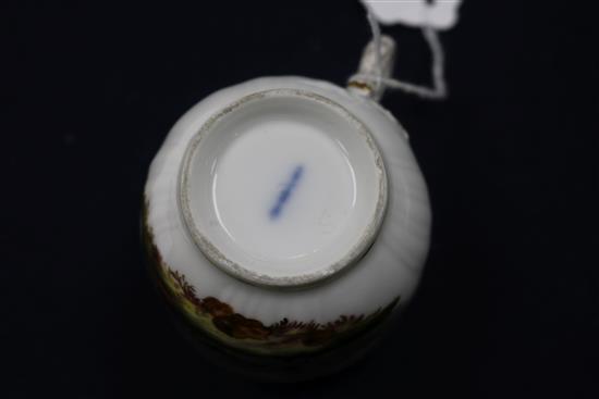 A Berlin cup and saucer, painted with birds and insects